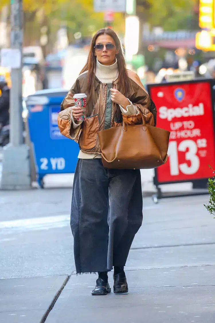 katie holmes in barrel jeans with loafers and socks